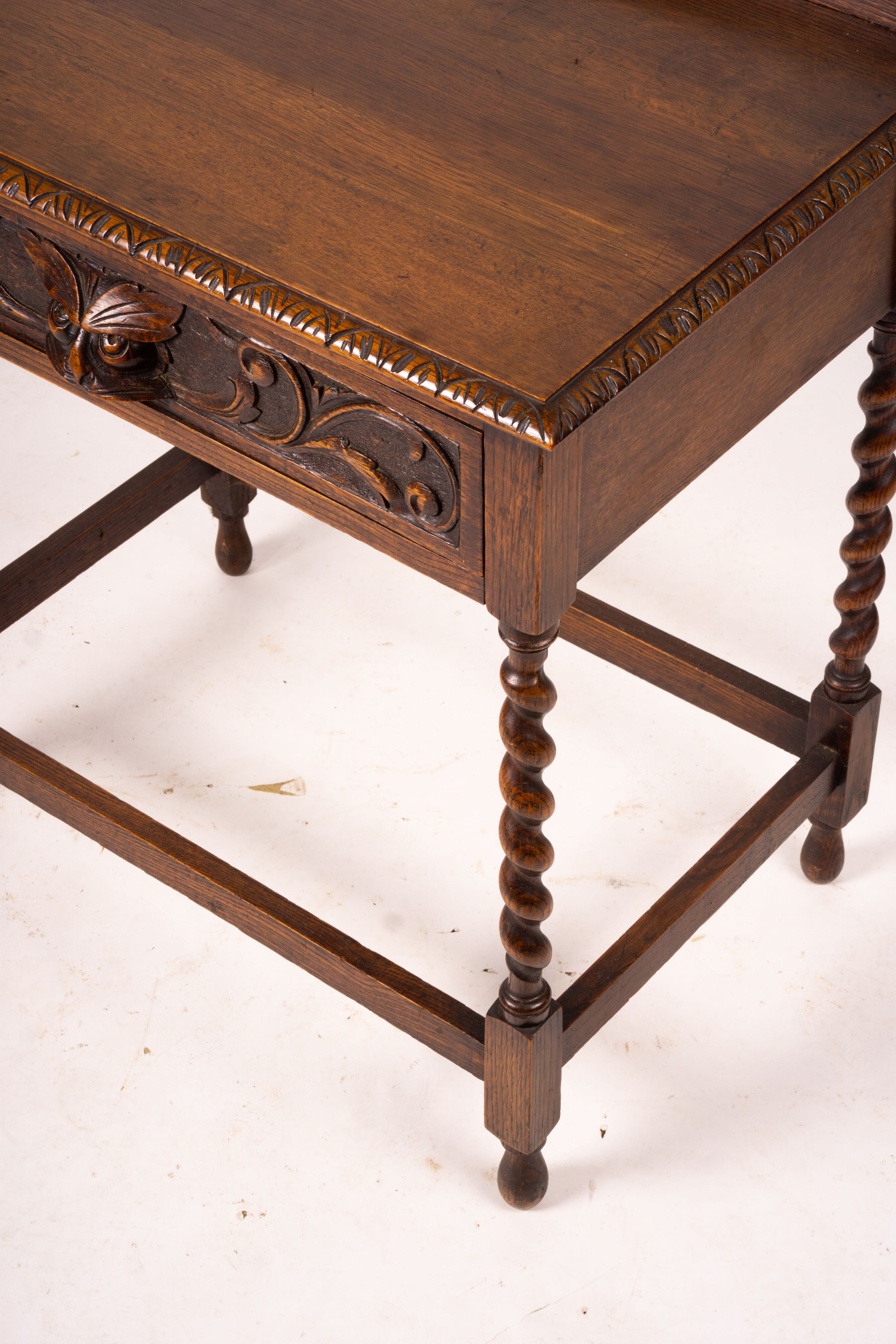 An early 20th century Flemish carved oak side table, W.69cm D.46cm H.77cm